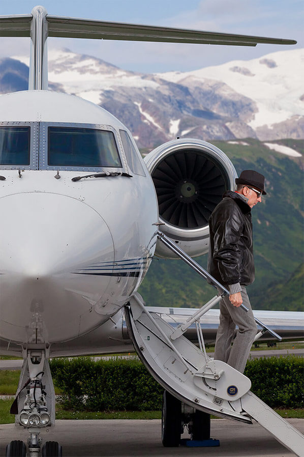 Passenger boarding a private jet